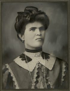 Retouched portrait of a woman in European dress.