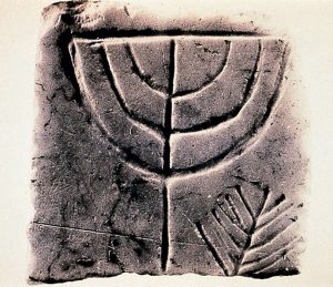 Marble fragment with engraved menorah found next to the synagogue in the Ancient Agora of Athens, dating from the 3rd century CE.