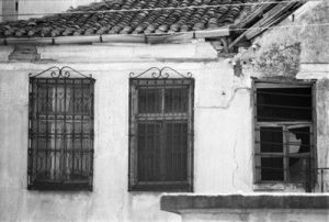 House -The new Synagogue of Xanthi-, with masks from scrolls over he windows.