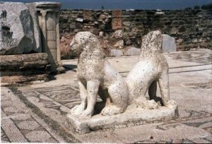 The Sardis Synagogue in Turkey. Detail from a statue of two lions back to back.