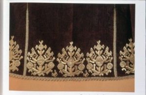 Gold embroidered hem of a silk bridal chemise of a female costume from Scopelos.