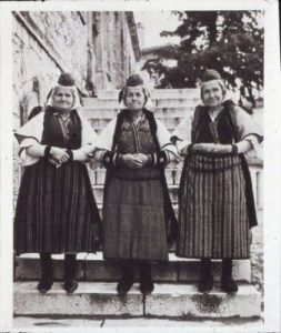 Three women from the vilage of Velvendo, Macedonia, in traditional costumes .