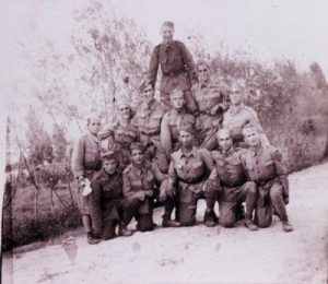 Photograph of soldiers, front row R: Mr. Benjamin Cohen, Albania.