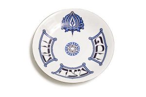 White glazed porcelain Seder plate, with blue and black decoration of Magen David, Lotus flower bud and Hebrew inscription 