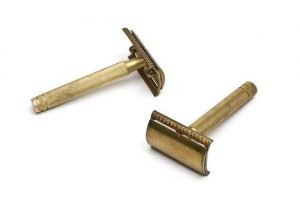 Two brass razors, manufactured in the factory 