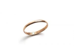 Gold ring inscribed.