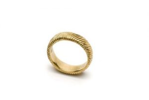 Gold wedding ring, bearing the initials 