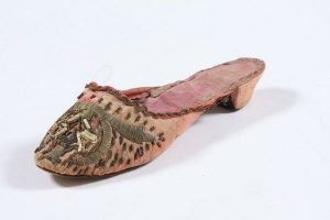 Single low-heel slipper, pink silk with gold embroidery and seed pearls, probably belonged to a member of the the local Jewish community.
