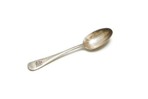 Silver cake spoon, decorated with flag motif and inscription 