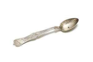 Turkish silver spoon with engraved floral decoration.