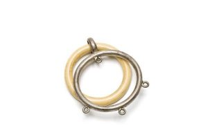 Plastic teether attached to silver ring with eyelets to hang on pendants.