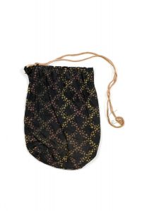 Drawstring bag for phylacteries, black cotton with printed pattern of yellow and pink dotted lattice, belonged to Baruh Errikos Koffina.