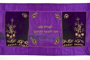 Reader's desk cover, purple and eggplant violet silk, made from gold embroidered domestic textile, dedicated in memory of Ity and Lazar Carasso.