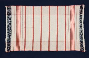 Cotton with red stripes, decorated with drawn threads, dowry item from Ioannina.