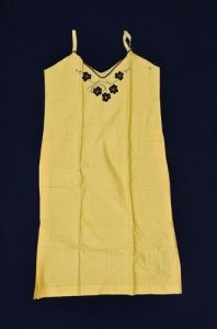Light yellow cotton with black flower applique and lace, dowry of Sarah-Nina Borboli, Trikala..