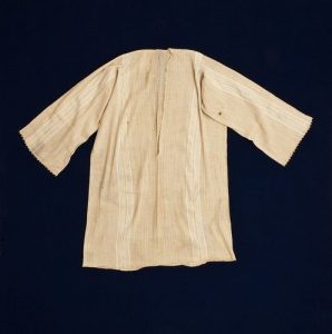 Cotton undershirt with vertical front opening.