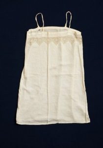 Sleeveless cotton with lace, belonged to Esther Modiano.