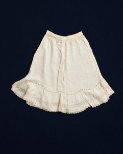 White cotton with lace, belonged to Esther Modiano.