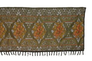 Olive green embroidery on black woven textile, black bead fringe.