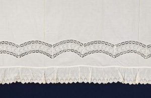 Cotton bed valance with Broderie Anglaise and lace, belonged to Esther Modiano.