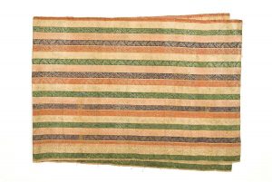 Damask with salmon, orange, green and dark blue stripes with foliate scroll pattern.