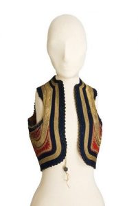 Men's red velvet waistcoat, heavily trimmed with gold and dark blue cords.