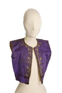 Purple silk waistcoat with gold embroidery.