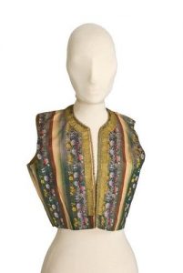 Striped silk waistcoat with coloured floral pattern, front opening and neckline trimmed with gold braid.
