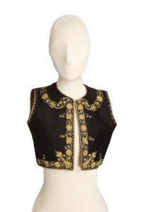 Dark brown velvet waistcoat edged with gold cord embroidery and sequins.