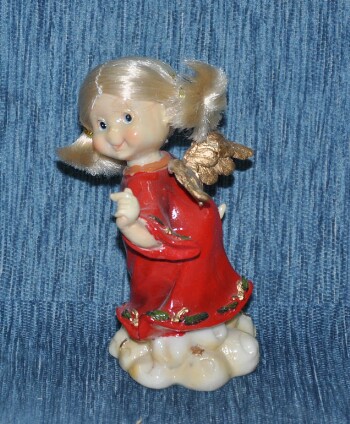 Wax angel in red