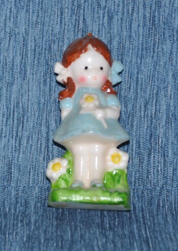 Wax little girl doll