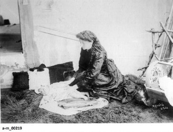 Vlach woman with her baby in Kleisoura. The sarmanitsa (crib) can be seen