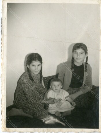 Two sisters with their niece