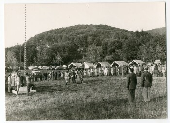 Hoisting the flag in an old Scouts meeting