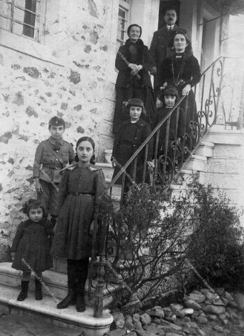 Family photograph at the entrance of the house, Livadi village 1912-1920