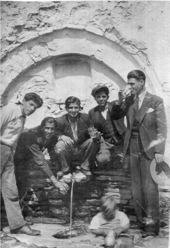 A group of young people at the tap of Papadimas, Kokkinoplos at the end of the 20s