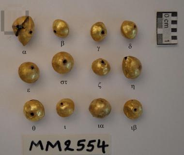 Gold biconical bead