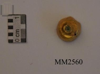 Part of a bead's gold coating