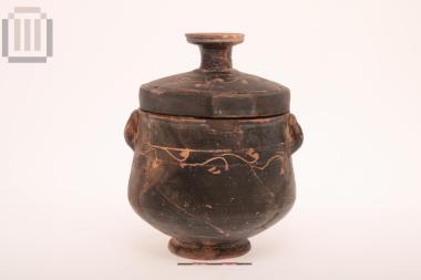Black-glazed pyxis