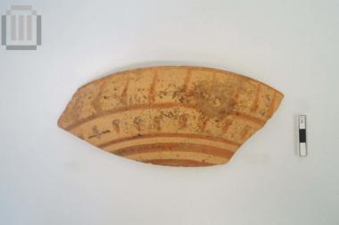 Fragmentary clay painted plate from Gardiki Paramythia