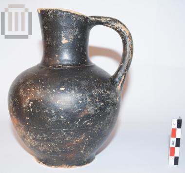 Black-glazed jug with cutaway neck