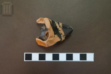 Nozzle fragment of a black-glazed lamp