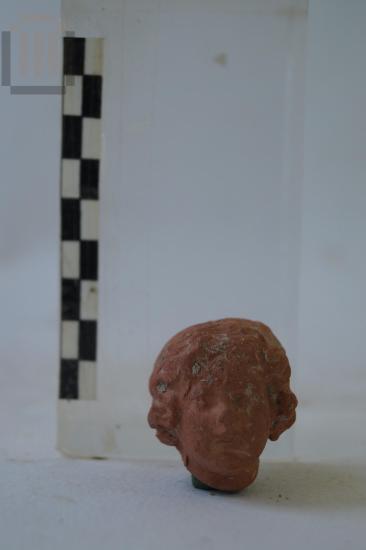 Κεφάλι πήλινου ειδωλίου παιδικής μορφής