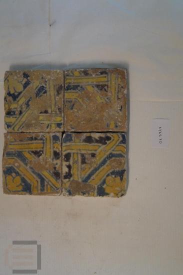 Four ceramic square tiles