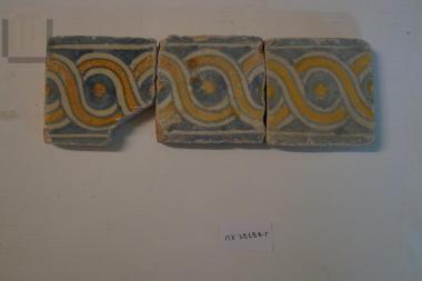 Three clay rectangular plaques