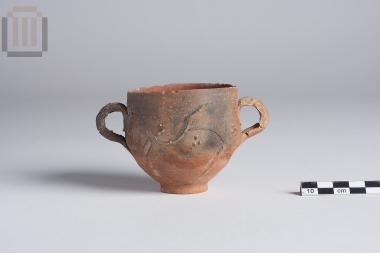 Two-handled skyphos with relief decoration