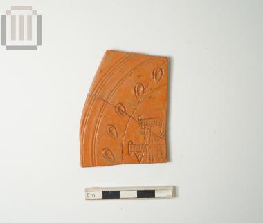 Fragmentary clay dish from Ladochori