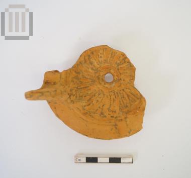 Clay lamp fragment from Ladochori