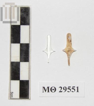 Two small glass centers of palmettes from the decoration of a kline