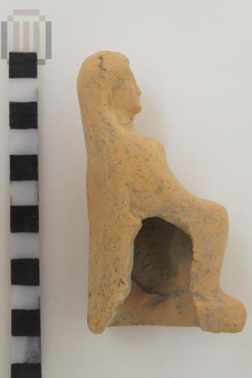 Female seated figurine